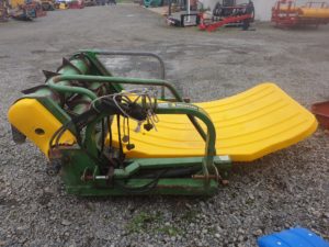 feeds out silage and hay to cattle